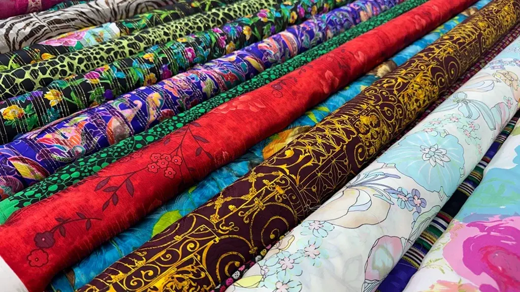 Rolls of patterned silk and brocade
